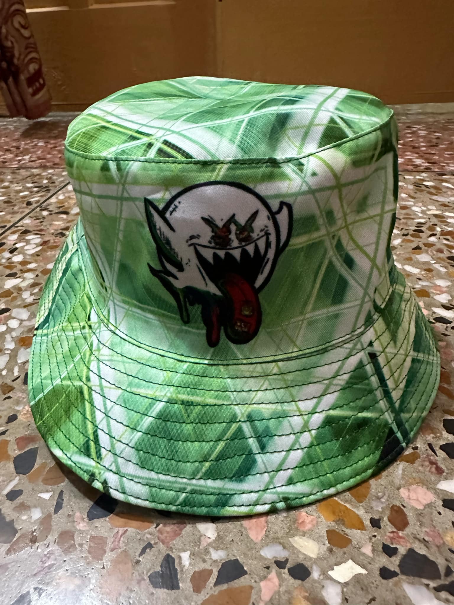 REVERSIBLE TAB-BOO BUCKET HAT
